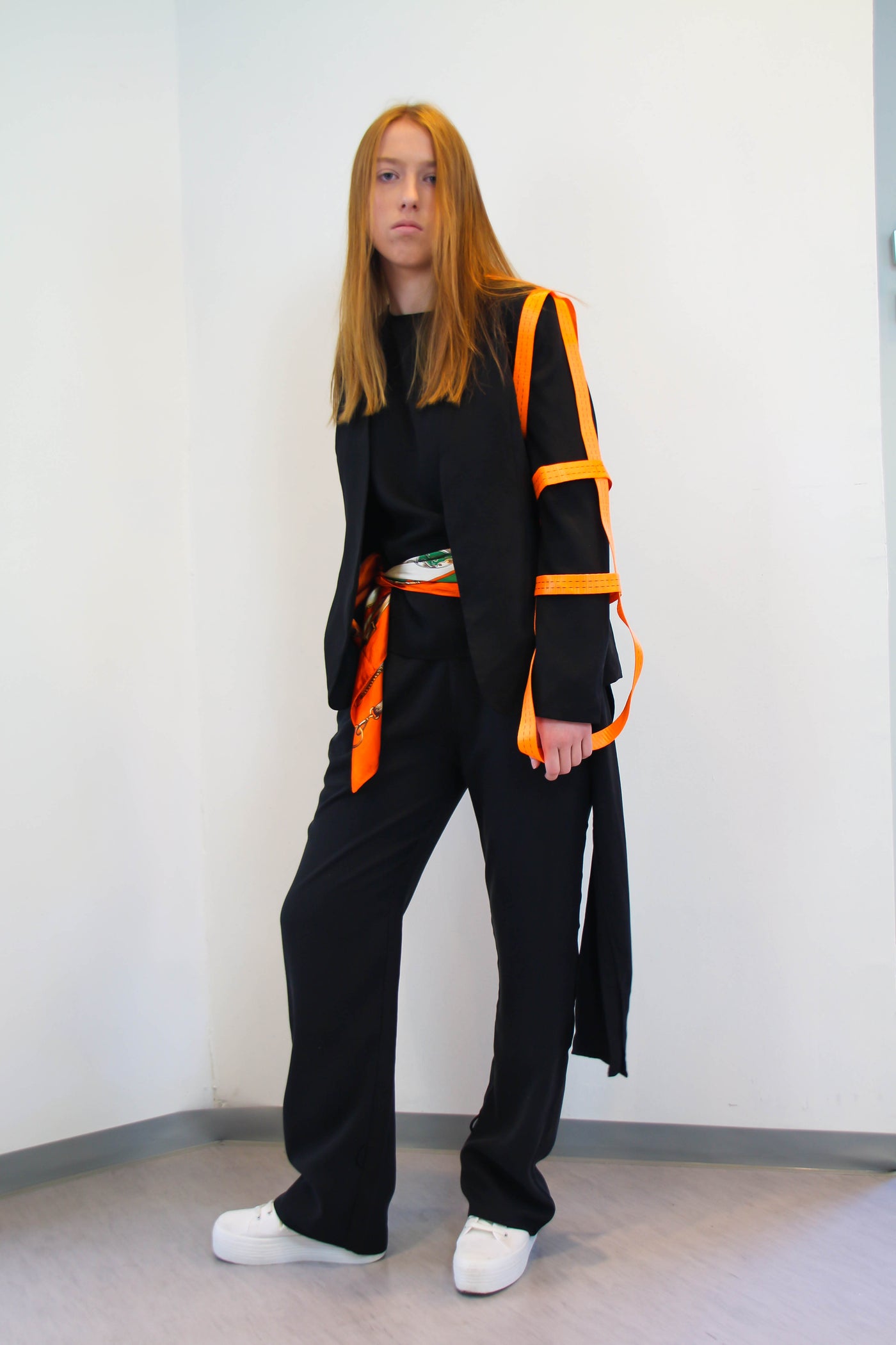 Blazer with orange detail on the arm