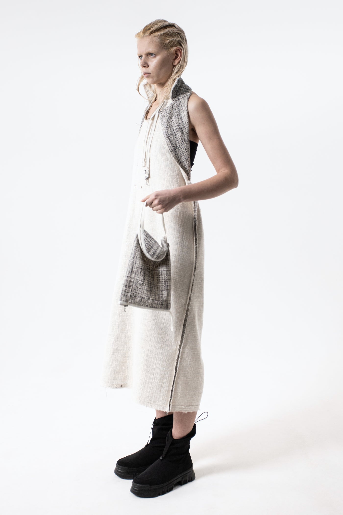 DUALITY 10 -way transforming piece: coat / jumpsuit / vest / dress / 4 bags