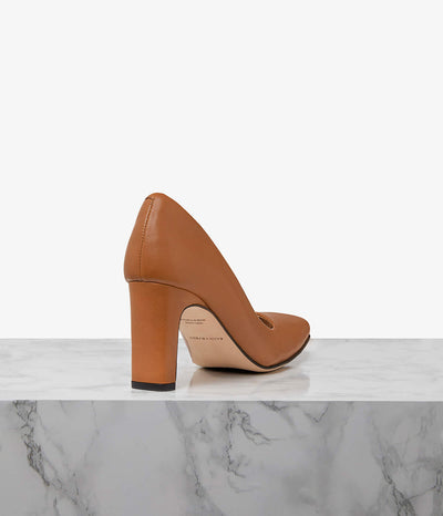 Designed with city living in mind, our block heel’s modern aesthetic makes for a versatile choice. Available in either super soft full-grain leather or embossed snake leather, the  spacious square toe box is comfortable enough for all-day wear while the chunky trapeze block heel adds the perfect amount of stability, support and lift on long days. Let the architectural silhouette add a directional feel to everything from wide-leg trousers to structured dresses.