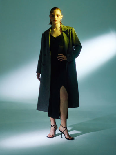Peak-lapels Double-breasted Coat in Dark Grey. A statement editorial winter look in London. A classic coat as seen on Vogue.