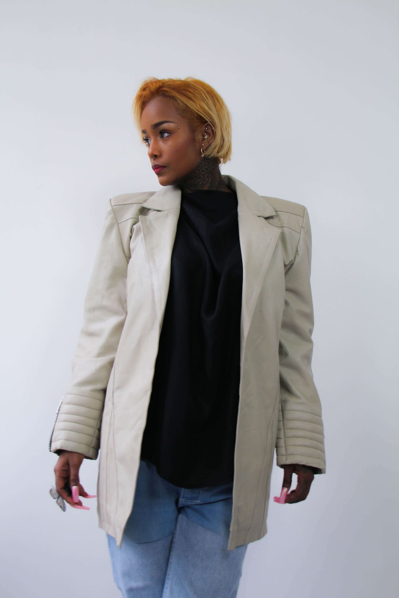 Leather jacket with exaggerated shoulders