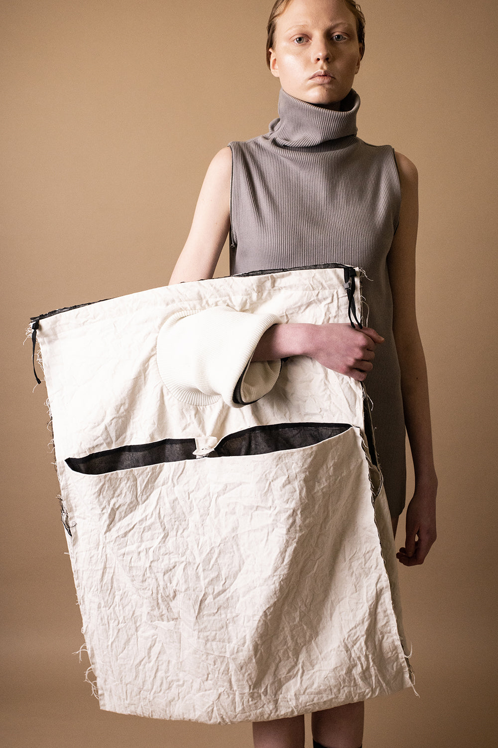 HYBRID 10-Way Transforming Piece: Coat / Hat / Bag - DZHUS - The Clothing Lounge