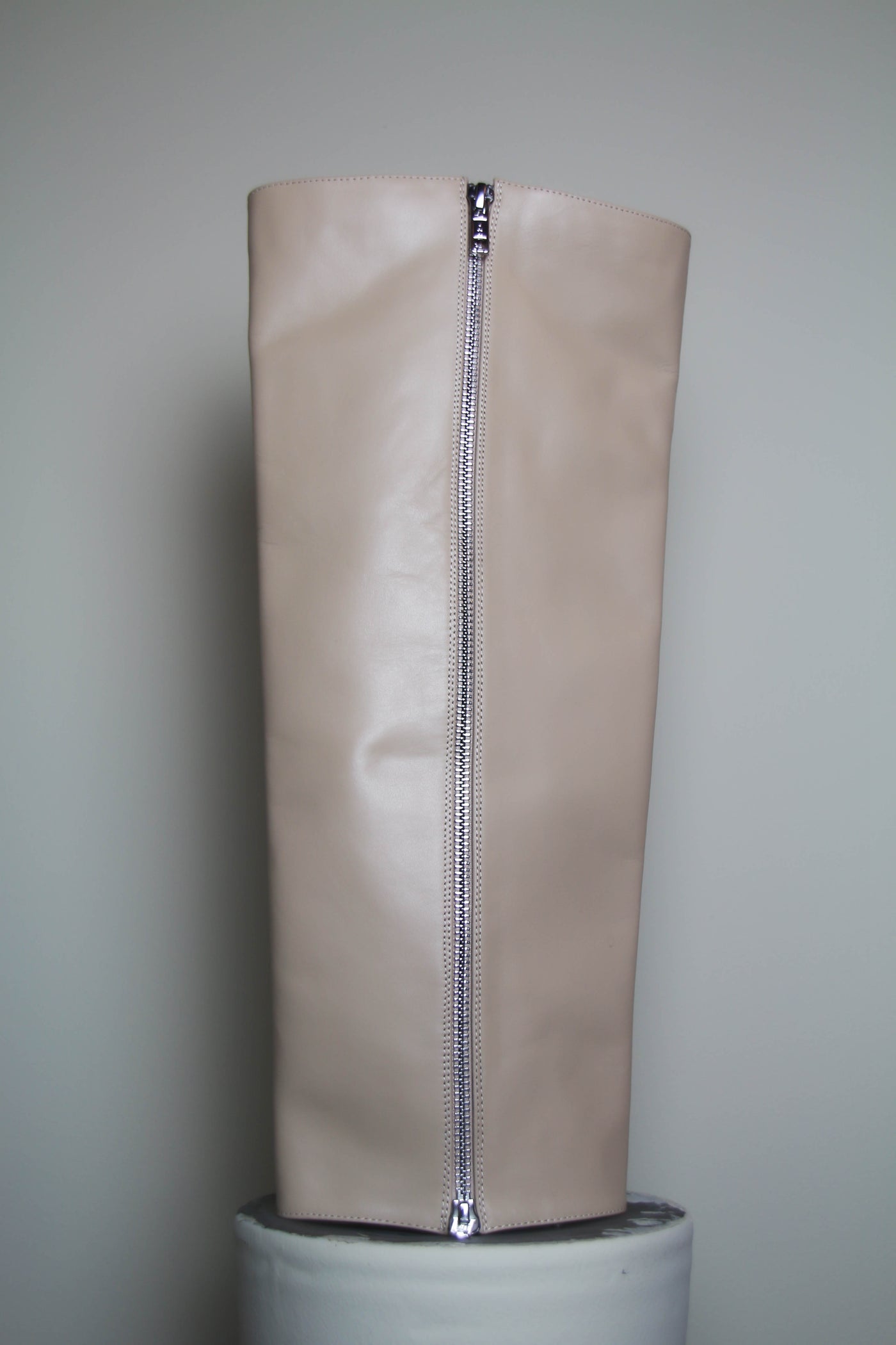 Beige boot extender