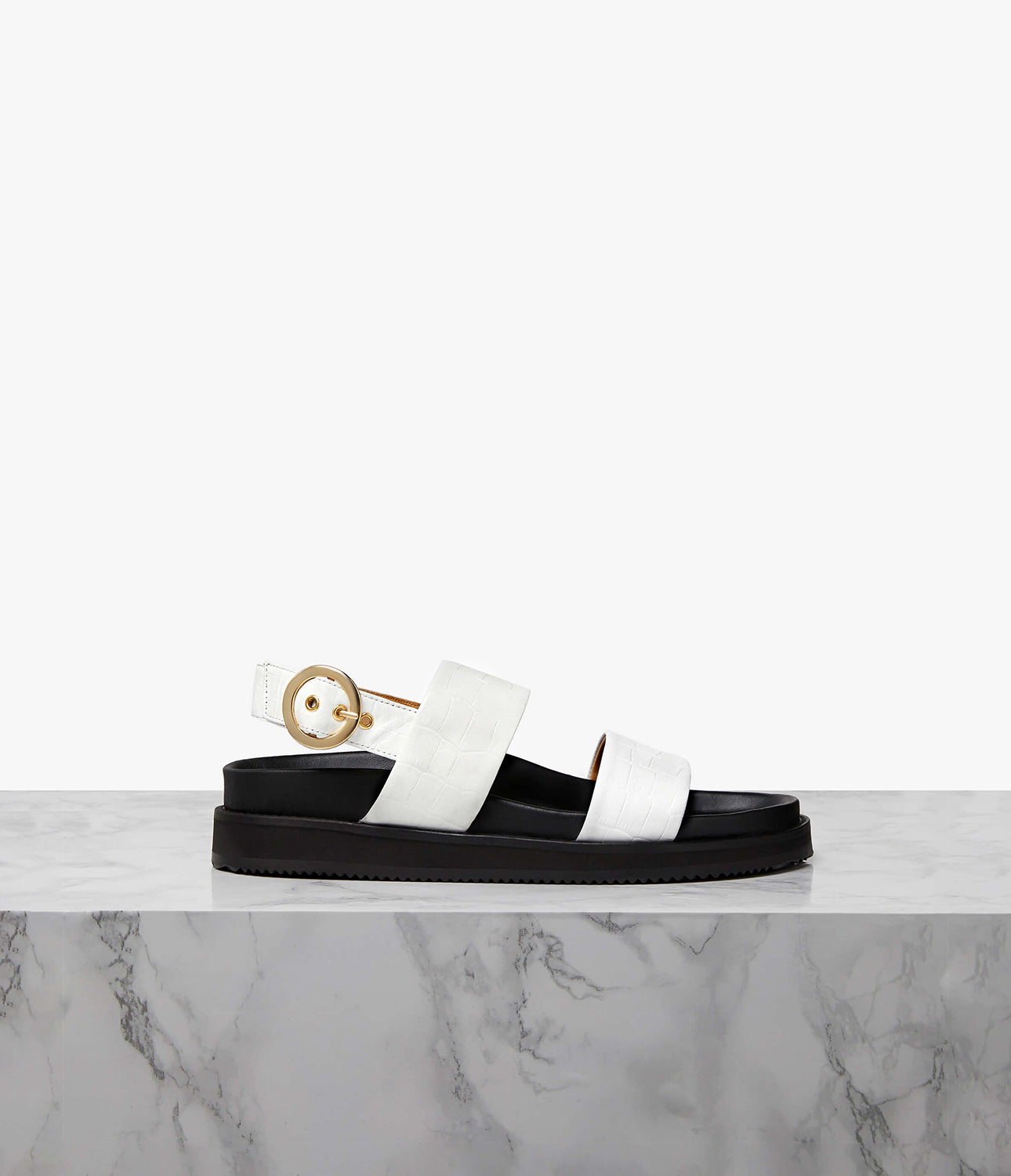 An elevated update to the sports slide, the Zephyr sandal is an everyday design classic with an athleisure twist. Set on a sturdy rubber sole, the ergonomic leather-covered footbed provides ample support for a day on your feet. Finished with a double-front strap to hold the foot in place, a cupped footbed design prevents sliding for a more conformed fit. Wear the Zephyr in the city now and pack it for holidays later.